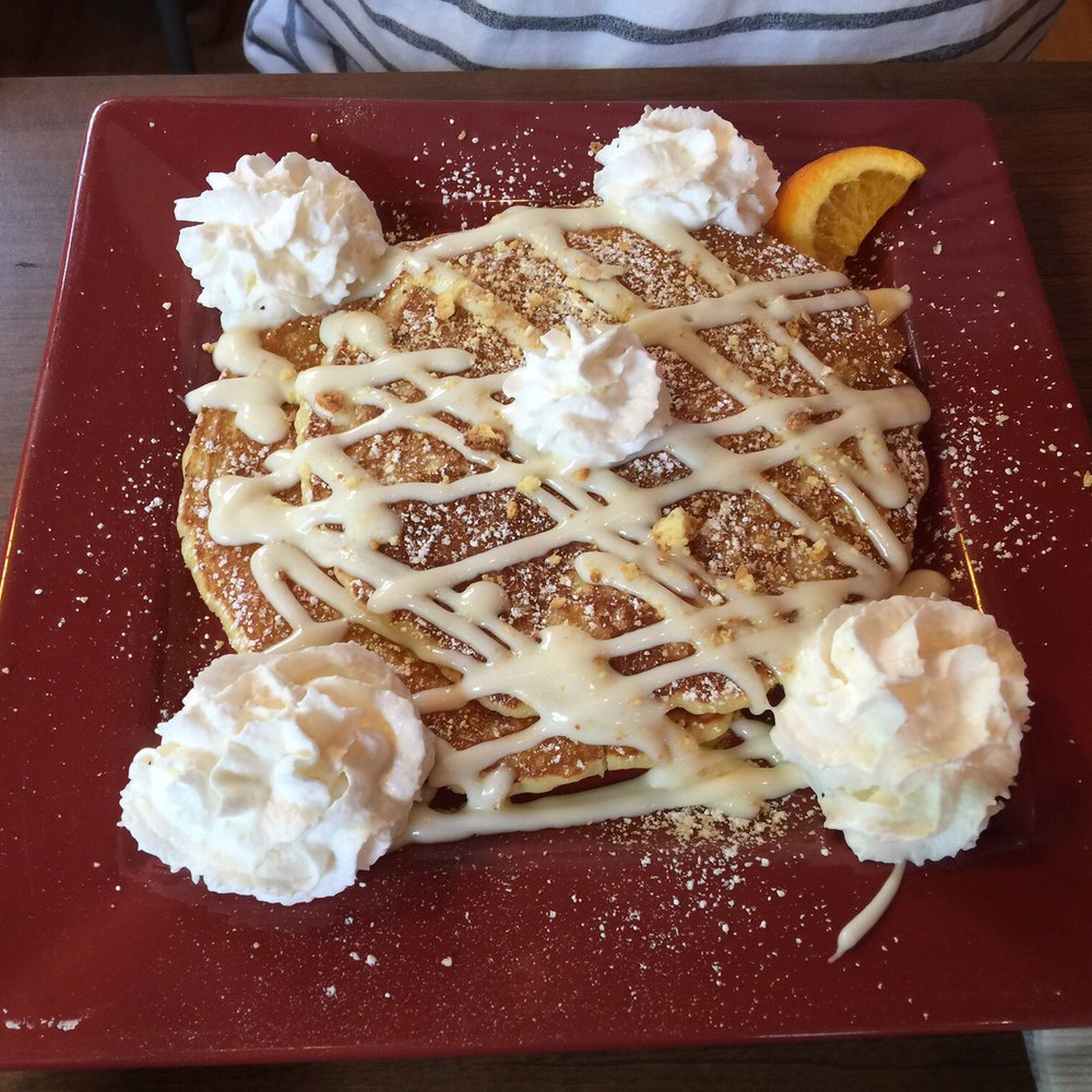 Toasted Mango Cafe - Crumble Lemon Cakes...very nice presentation but way too many nuts - Cafes Near Me - Sarasota, Florida Toasted Mango Cafe - Crumble Lemon Cakes...very nice presentation but way too many nuts - Cafes Near Me - Sarasota, Florida