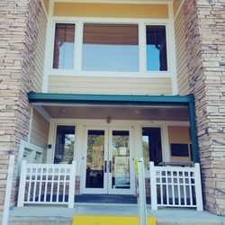 Sequoyah Regional Libraries - Woodstock Public Library - The front entrance. Glad they finally put something to keep people from parking up front here....