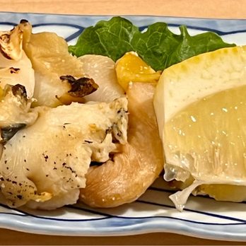 Sharaku - a piece of lemon on a plate - Sushi Bars Near Me - West Bloomfield, Michigan Sharaku - a piece of lemon on a plate - Sushi Bars Near Me - West Bloomfield, Michigan