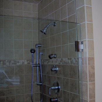 The Floor Works - a shower in a tiled bathroom - Flooring Near Me - Bethlehem, New Hampshire The Floor Works - a shower in a tiled bathroom - Flooring Near Me - Bethlehem, New Hampshire