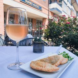 Sunset 44 Bistro - Empanada appetizer and Miraflores rosé on the PATIO