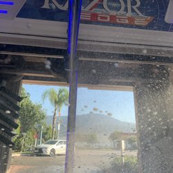 Chevron - Car wash basic $6, park and the machine washes, no conveyor belt.