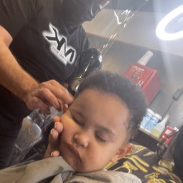 My Little mans knocked out while getting his cut. My Little mans knocked out while getting his cut.