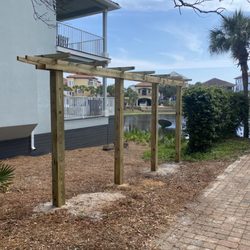 Lawn Gods - Arbor constructed and installed, ready for Jasmine Vine! Excellent work!