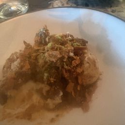 Gnudi with duck confit and peaches. Gnudi with duck confit and peaches.