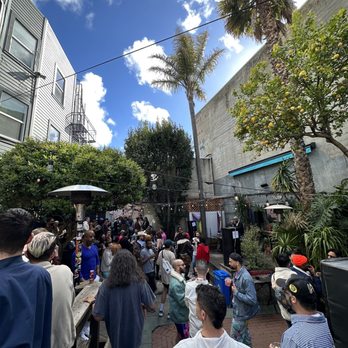 El Rio - a crowd of people walking down a street - Music Venues Near Me - San Francisco, California El Rio - a crowd of people walking down a street - Music Venues Near Me - San Francisco, California