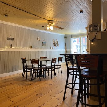 The Granite Grind - a dining room with wooden floors - Coffee & Tea Near Me - Lancaster, New Hampshire