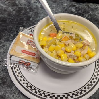 Bun 'N Cone - Lots of ingredients in this chicken soup...corn, carrots, celery, chicken and parsley - New American Near Me - Margaretville, New York Bun 'N Cone - Lots of ingredients in this chicken soup...corn, carrots, celery, chicken and parsley - New American Near Me - Margaretville, New York