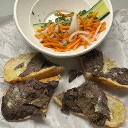 Banh Shop - Steak Banh mi with veggies on the side. 1/10.