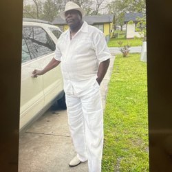 Staples - Man in white suit
