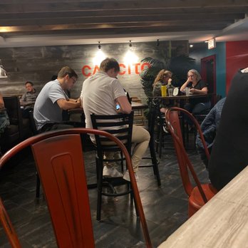 Cafecito - We are sitting at the bar but there is other table service in the back of the cafe - Cuban Near Me - Chicago, Illinois Cafecito - We are sitting at the bar but there is other table service in the back of the cafe - Cuban Near Me - Chicago, Illinois