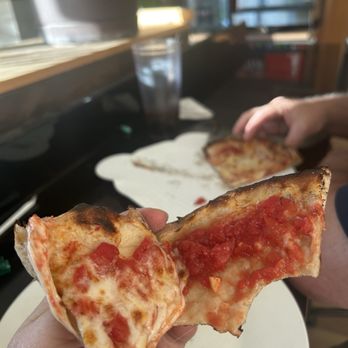 Roots Wood Fire - Cheese kiss - Pizza Near Me - Coeur d'Alene, Idaho Roots Wood Fire - Cheese kiss - Pizza Near Me - Coeur d'Alene, Idaho