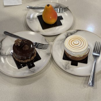 Duc de Lorraine - pear dessert, lemon meringue, and Ferrero chocolate cake - French Near Me - Montreal, Quebec