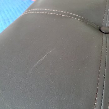 Ashley Store + Outlet - Scratch on the leather covered bench. - Furniture Stores Near Me - Mechanicsburg, Pennsylvania