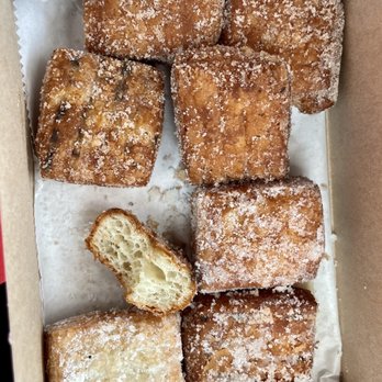 Parlor Doughnuts - Mini donuts. Cinnamon & coconut cream. Crunch outside and airy and light in the middle. Coconut had a creamy filling. - Coffee & Tea Near Me - Pensacola, Florida Parlor Doughnuts - Mini donuts. Cinnamon & coconut cream. Crunch outside and airy and light in the middle. Coconut had a creamy filling. - Coffee & Tea Near Me - Pensacola, Florida