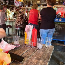 a woman sitting at a table a woman sitting at a table