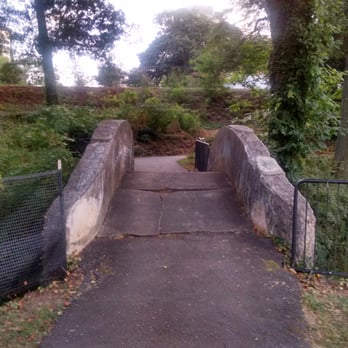 McPherson Park - Crossing bridge leading to various paths. - Parks Near Me - Greenville, South Carolina McPherson Park - Crossing bridge leading to various paths. - Parks Near Me - Greenville, South Carolina