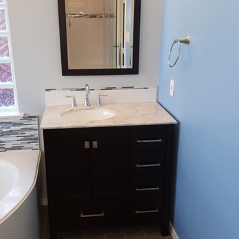 Renovate4less - New vanity with custom back splash, new mirror and new lighting. - General Contractors Near Me - Lewisville, Texas Renovate4less - New vanity with custom back splash, new mirror and new lighting. - General Contractors Near Me - Lewisville, Texas