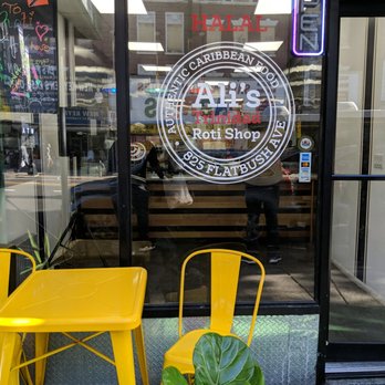 Ali's Roti Shop 3 - yellow chairs and table - Caribbean Near Me - Brooklyn, New York Ali's Roti Shop 3 - yellow chairs and table - Caribbean Near Me - Brooklyn, New York