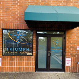 Exterior outside entrance of Triumph Physical Therapy - Entrance and parking located only in the rear of the building - University Place, Washington Exterior outside entrance of Triumph Physical Therapy - Entrance and parking located only in the rear of the building - University Place, Washington