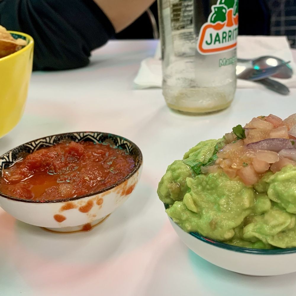 Guacamole $6 bowl looks deceptively large in photo but is similar size as salsa bowl (small)