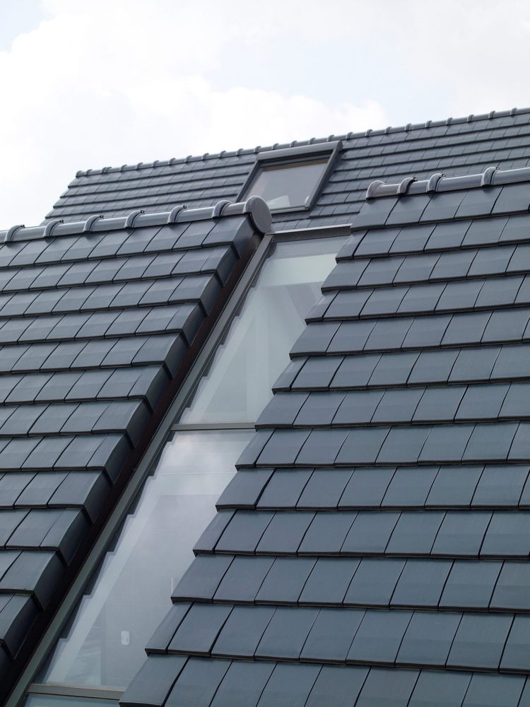 Slide of Ben Roofing