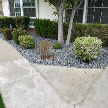 Tough Turf - redesigned the front with rocks to replace just a dirt patch - Artificial Turf Near Me - Artesia, California Tough Turf - redesigned the front with rocks to replace just a dirt patch - Artificial Turf Near Me - Artesia, California