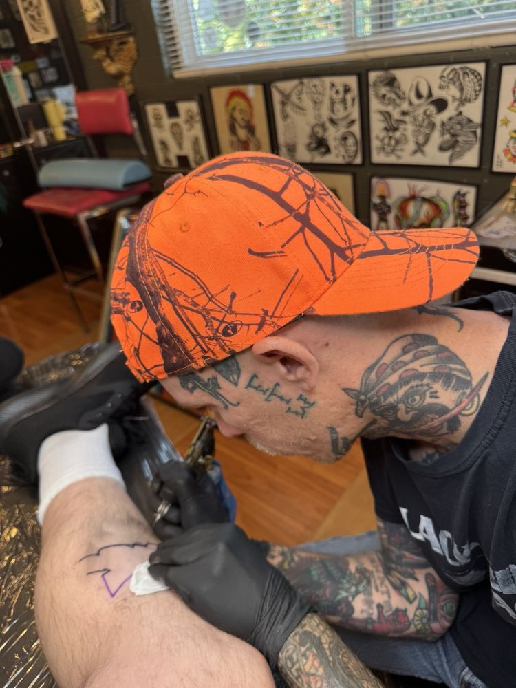 Monkey Wrench Tattoo Logo