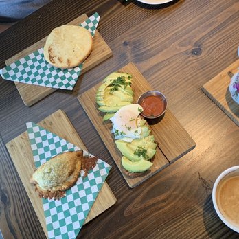 Bunbury - Spinach Zucchini Parmesan Cheese Empanada, avocado toast, Goat Cheese and Ratatouille Empanada - Argentine Near Me - Miami, Florida