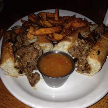 Train Wreck Bar - Philly Cheesesteak no onions or mushrooms with sweet potato fries - Sports Bars Near Me - Burlington, Washington Train Wreck Bar - Philly Cheesesteak no onions or mushrooms with sweet potato fries - Sports Bars Near Me - Burlington, Washington
