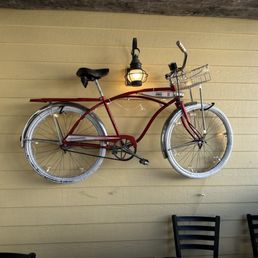 a bicycle mounted on the wall a bicycle mounted on the wall