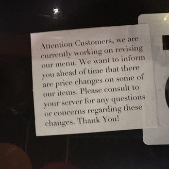 Saigon City Restaurant - Price change notice at the table. - Vietnamese Near Me - Albuquerque, New Mexico