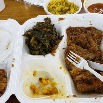 Big Daddy's Kitchen - That is all the BREAD on the left side from my pork chop! Those burnt greens!!!!! - Soul Food Near Me - Atlanta, Georgia