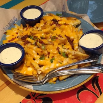 Islands Restaurant - Yummy cheese fries appetizer - Burgers Near Me - Palm Desert, California Islands Restaurant - Yummy cheese fries appetizer - Burgers Near Me - Palm Desert, California