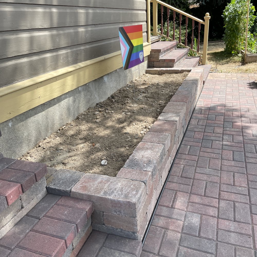 brick walkway & planter between two sets of steps