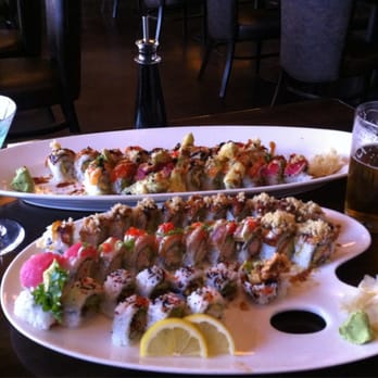 Raw Sushi Bistro - From front to back - spider roll, rainbow roll dragon roll, Dante's inferno roll, tiger roll. - Sushi Bars Near Me - Modesto, California Raw Sushi Bistro - From front to back - spider roll, rainbow roll dragon roll, Dante's inferno roll, tiger roll. - Sushi Bars Near Me - Modesto, California