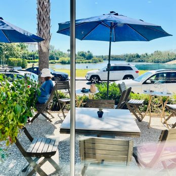 Café Eugenia - Outdoor seating overlooking the Lake at Freshfields Village - New American Near Me - Johns Island, South Carolina Café Eugenia - Outdoor seating overlooking the Lake at Freshfields Village - New American Near Me - Johns Island, South Carolina