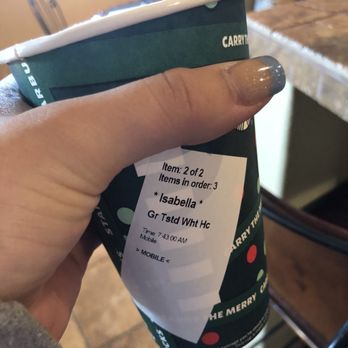 Starbucks - a person holding a cup of coffee - Coffee & Tea Near Me - Palm Desert, California Starbucks - a person holding a cup of coffee - Coffee & Tea Near Me - Palm Desert, California
