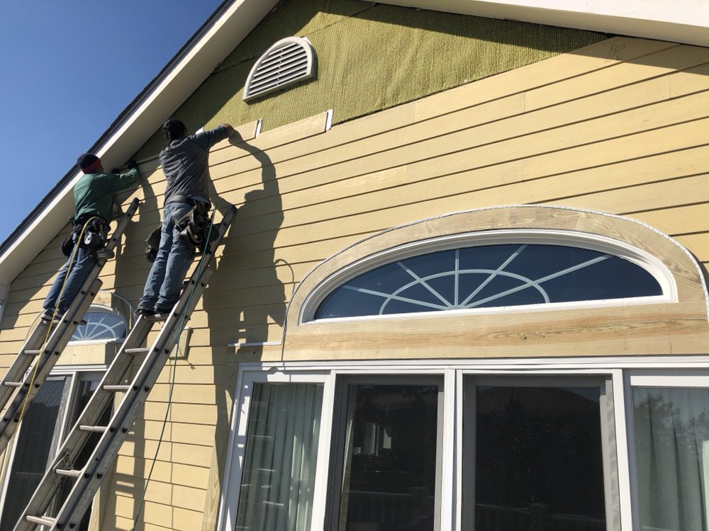 Slide of Canaan roofing and gutters