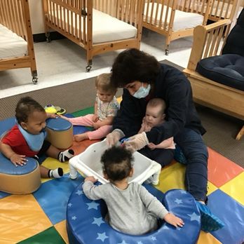 West Kingsland KinderCare - Learning sensory play with group peers - Preschools Near Me - Katy, Texas
