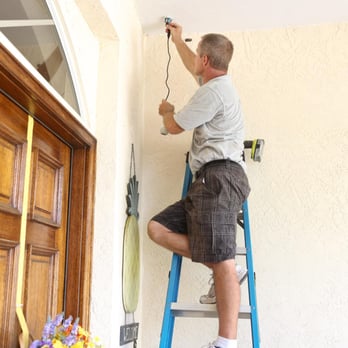 HomeSmart Central - Wiring that is neat and professionally concealed for a Surveillance Camera at the front door. - Home Theatre Installation Near Me - Sarasota, Florida