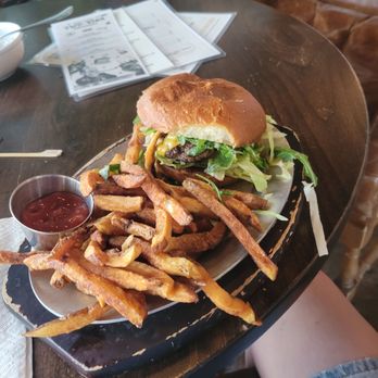 Double Standard - The American Standard Burger with my side salad on it. - Bars Near Me - San Antonio, Texas Double Standard - The American Standard Burger with my side salad on it. - Bars Near Me - San Antonio, Texas