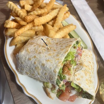 Herb's - Wrap with crispy chicken, tomato, lettuce, red onion, Mayo & cheddar cheese. - Delis Near Me - Uncasville, Connecticut Herb's - Wrap with crispy chicken, tomato, lettuce, red onion, Mayo & cheddar cheese. - Delis Near Me - Uncasville, Connecticut