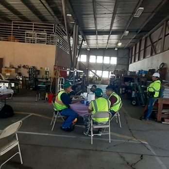 El Pollo Feliz - workers working in a warehouse - Mexican Near Me - North Highlands, California El Pollo Feliz - workers working in a warehouse - Mexican Near Me - North Highlands, California
