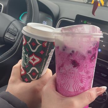Starbucks - a hand holding a cup of pink drink - Coffee & Tea Near Me - La Salle, Quebec Starbucks - a hand holding a cup of pink drink - Coffee & Tea Near Me - La Salle, Quebec