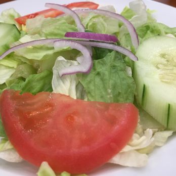 Mazadar Mediterranean Kitchen - The salad is the second best vehicle for the white sauce. Second to the rice. And for a January tomato, that's lookin' mighty fine. - Mediterranean Near Me - Albany, New York