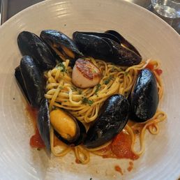 Seafood pasta with muscles and scallops Seafood pasta with muscles and scallops