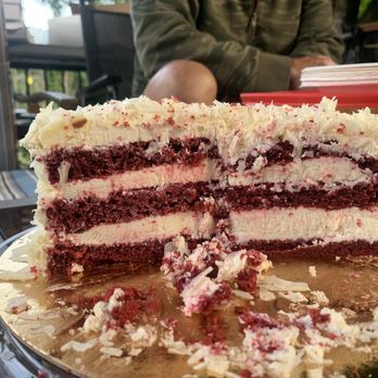 Les Délices Lafrenaie - a slice taken out of a red velvet cake - Bakeries Near Me - Pointe-Claire, Quebec Les Délices Lafrenaie - a slice taken out of a red velvet cake - Bakeries Near Me - Pointe-Claire, Quebec