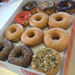  a variety of donuts in a box