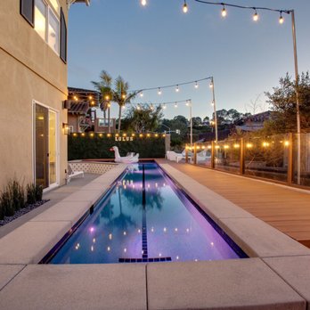 Epic Landscape Construction - a pool and deck with string lights - Landscape Architects or Designers Near Me - Jamul, California Epic Landscape Construction - a pool and deck with string lights - Landscape Architects or Designers Near Me - Jamul, California